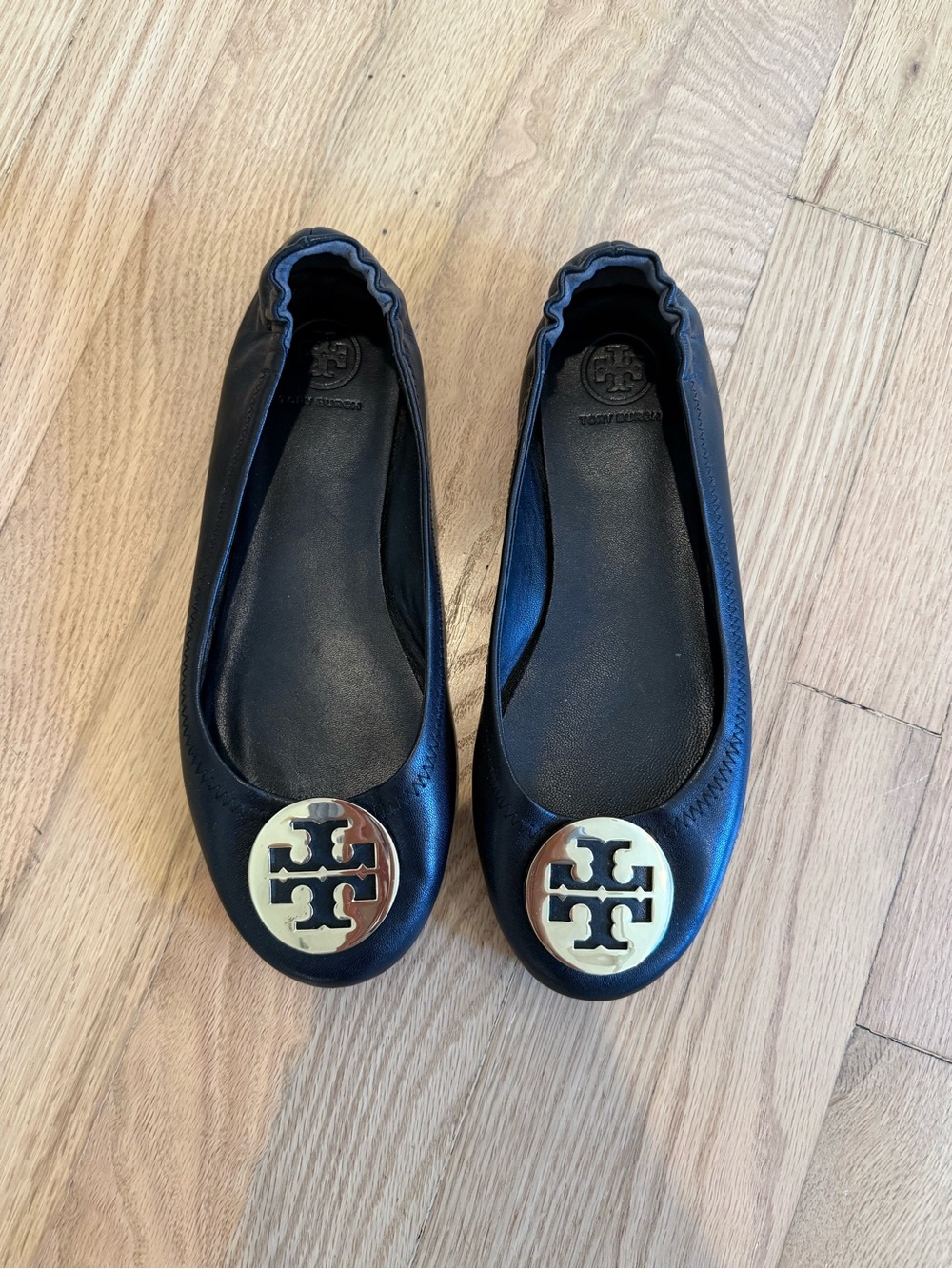 Tory Burch Black Leather Logo Ballet Flats with Gold Emblem